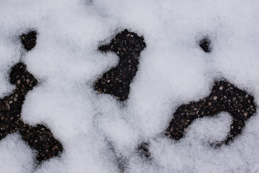 Борская администрация расторгнет контракт с подрядчиком, уложившим асфальт в снег